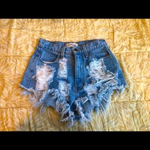 Vibrant M. I. U. distressed shorts